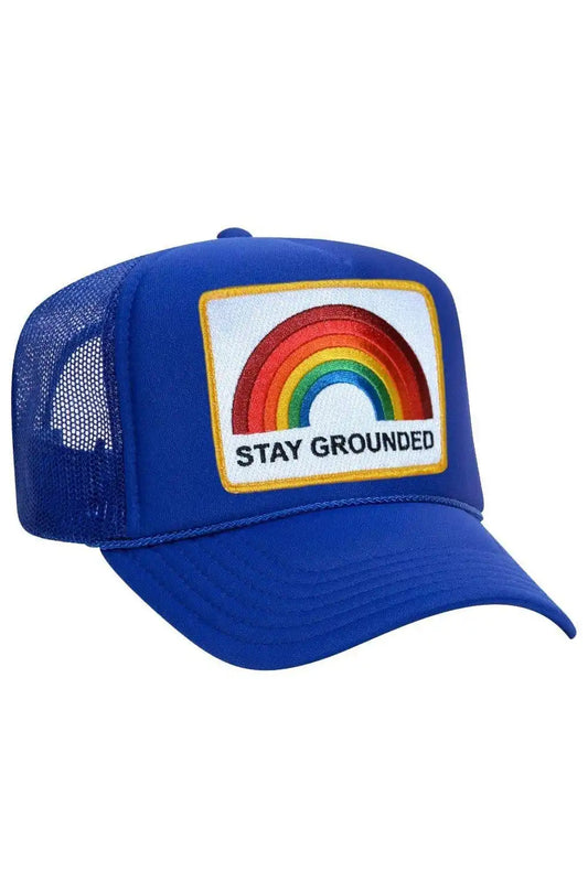 STAY GROUNDED TRUCKER HAT