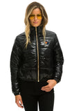 SUNBURST APRES PUFFER JACKET - GLOSSY BLACK